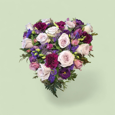 Loose Heart - A  heart-shaped tribute filled with warm seasonal colours to celebrate a life well lived.